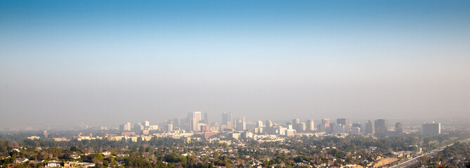 A panarama view of downtown Los Angles California on a smogy morning.