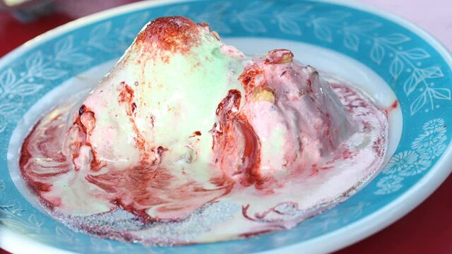 Time-Lapse Ice Cream Sundae melts (4k video)
