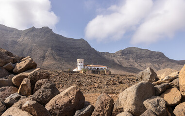 The remote Villa Winter, on a sunny day on the beach of Cofete on the island of Fuerteventura. House indicated for distance tourism.