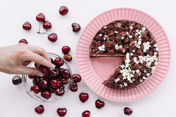  Cherry and chocolate cake on table