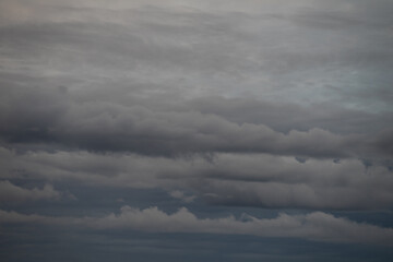 Dark ominous grey clouds. Dramatic sky.