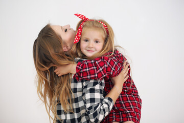 Emotions. Happy loving family. Mother and daughter spend time together at home.