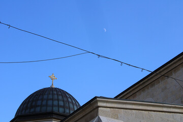Fototapeta na wymiar church top under the blue sky