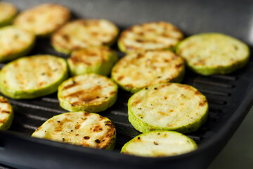 Grilled vegetables in a pan. Close-up of zucchini and sweet peppers
