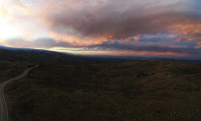 Fototapeta premium sunset in the mountains in the sky aerial photography