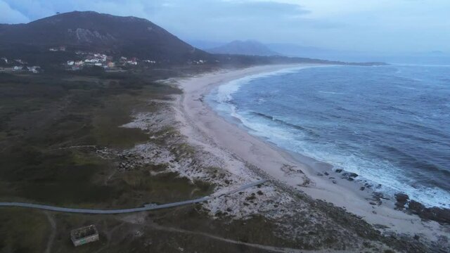 Beautiful beach at sunset in Spain. Aerial Drone Footage