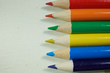 Colorful and sharpened artists pencils in rainbow colors