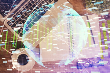 Business theme hologram drawings over computer on the desktop background. Top view. Multi exposure. Concept of international connections.