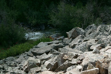 Mining trail wreck of where a truck slipped off the narrow mountain trail