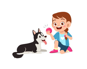 happy cute little kid boy girl play with pet dog