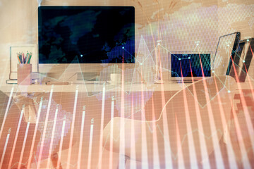 Double exposure of stock market graph drawing and office interior background. Concept of financial analysis.