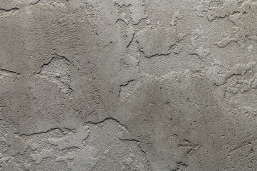 Abstract gray concrete wall plaster texture.
