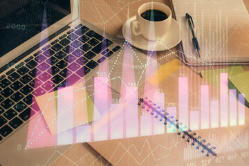 Fototapeta na wymiar Multi exposure of forex graph drawing and desktop with coffee and items on table background. Concept of financial market trading