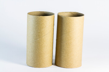 Roll toilet paper inside cardboard tube on white background