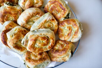 Home made donut pie with spinach and cheese. It is the most famous food of the Mediterranean. Vegan food. 