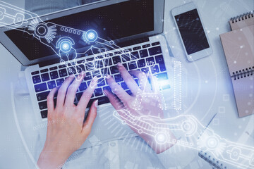 Double exposure of woman hands working on computer and data theme hologram drawing. Top View. Technology concept.