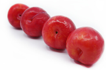 Plums isolated on a white background. Fresh plum. Closeup