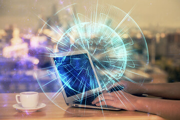 Multi exposure of woman hands typing on computer and business theme hologram drawing. Success concept.