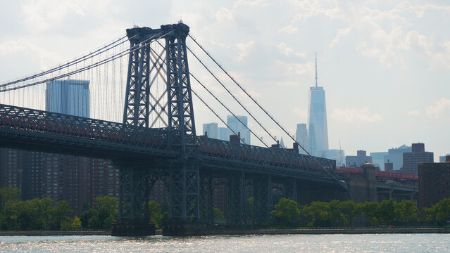 landscape of NYC and Williamsburg bridge with east river © mimilee