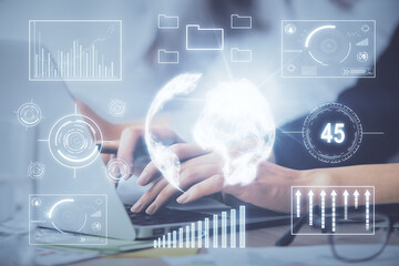 Multi exposure of woman hands typing on computer and financial graph hologram drawing. Stock market analysis concept.