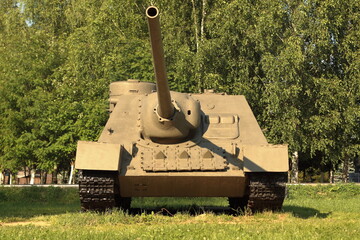 Old tank under the trees, participated in the 2nd world war.