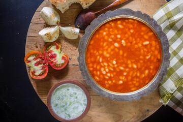 An Anatolian culture dish, bulgur pilaf and bean dish at the table