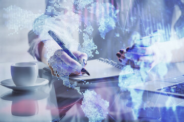 Double exposure of financial graph sketch hologram and woman holding and using a mobile device. Stock exchange concept.