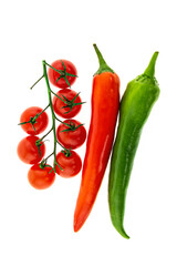 pair of peppers and tomato on white isolated. Red green spicy and seasoning tomatoes