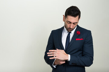 Portrait of handsome bearded businessman in suit