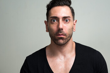 Obraz premium Portrait of handsome man with beard stubble