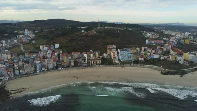 Beautiful beach and villlage of Malpica in Galicia. Aerial Drone Footage.