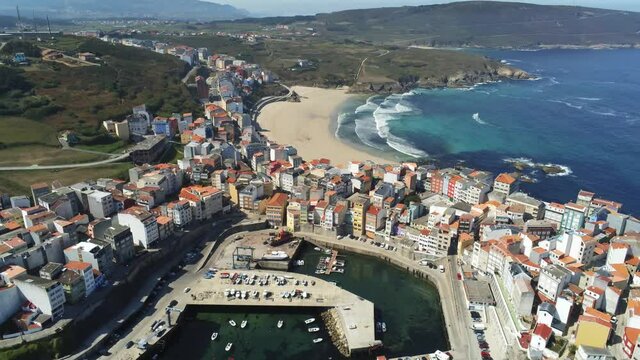 Beautiful beach and villlage of Malpica in Galicia. Aerial Drone Footage