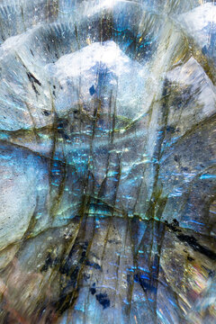 Extreme macro photo of a colorful blue and green labradorite stone.  I used special lighting to enhance the mountain landscape shapes I found within the cracks of the stone.