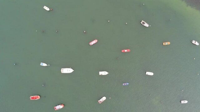 Boats moored in Coastal village of Galicia,Spain. Aerial Drone Footage