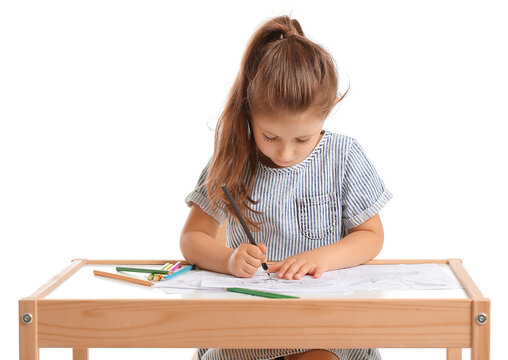 Cute little girl coloring pictures on white background