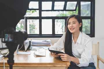 Influencer and content creator in digital marketing concepts. Young woman arecord video content to her channel.