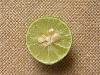 Cut cross section detail of green raw fresh Lime fruit