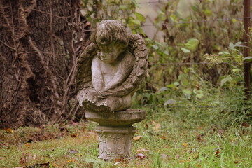 An old grave marker in a cemetery