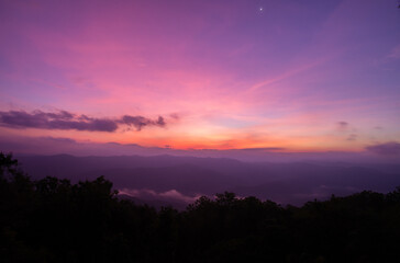 Beautiful mountain view with fog, sunrise scene, Doi Samer Dao mountain in Nan province, Thailand