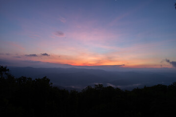 Beautiful mountain view with fog, sunrise scene, Doi Samer Dao mountain in Nan province, Thailand