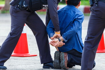 police helped to catch the guilty and lock the handcuffs,arrested.