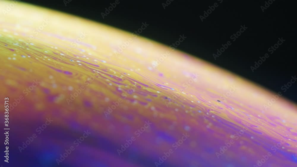 Wall mural fluid dynamics and light refraction diffraction in soap bubble surface close up