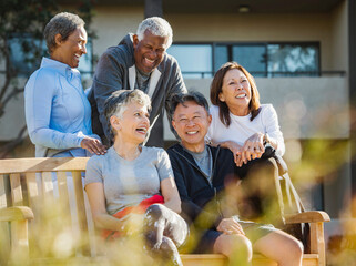 group of happy senior people together outdoors