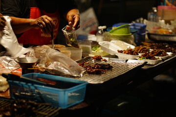 Thai Street food in the night market  at Thailand