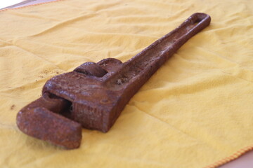 old rusty pipe wrench