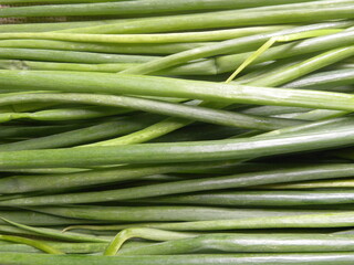 Green color raw whole fresh Scallion leaves