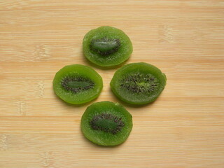 Green color dried round Kiwi slices