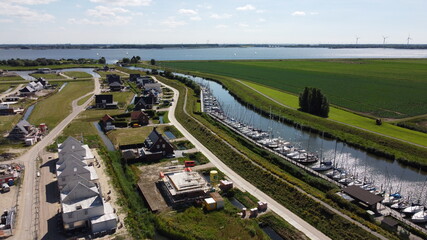 Harbor spot Numansdorp in the Netherlands, Aerial view of harbor view and new housing estate.