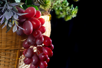 fresh fruit grapes on black background 