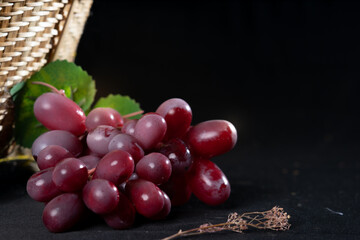 fresh fruit grapes on black background 